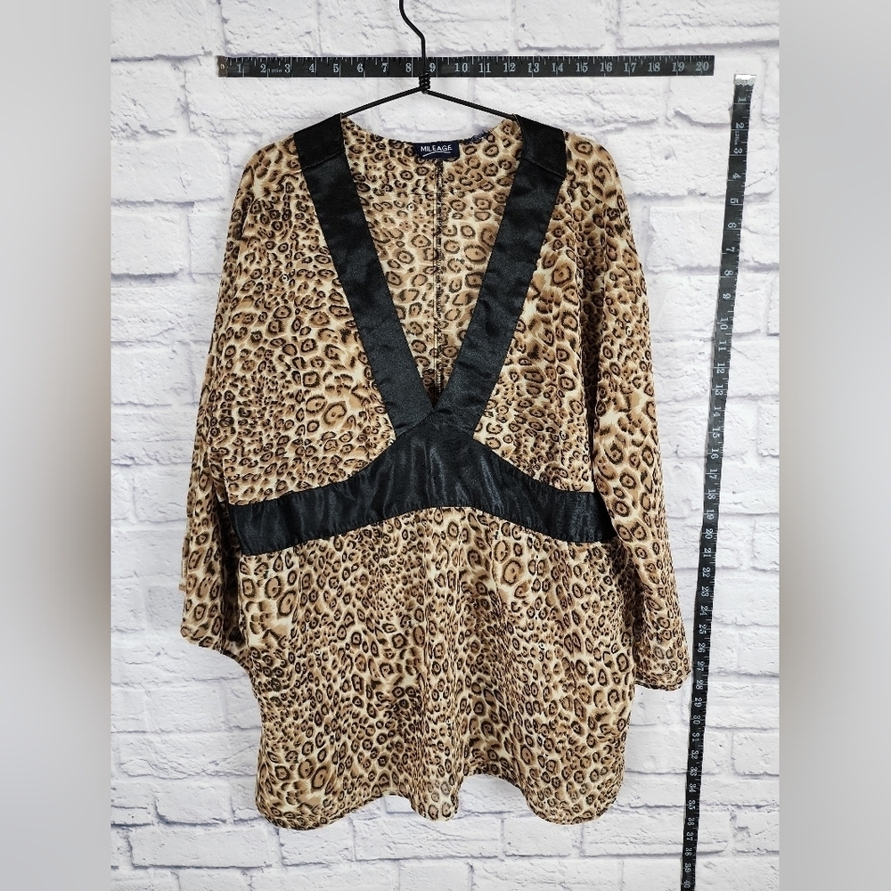 Bold animal print sem-sheer blouse by Mileage. Casual, loose, and flowy